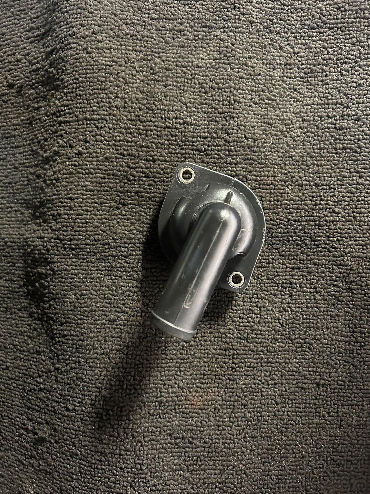 Rebuilt Mercury Verado thermostat housing