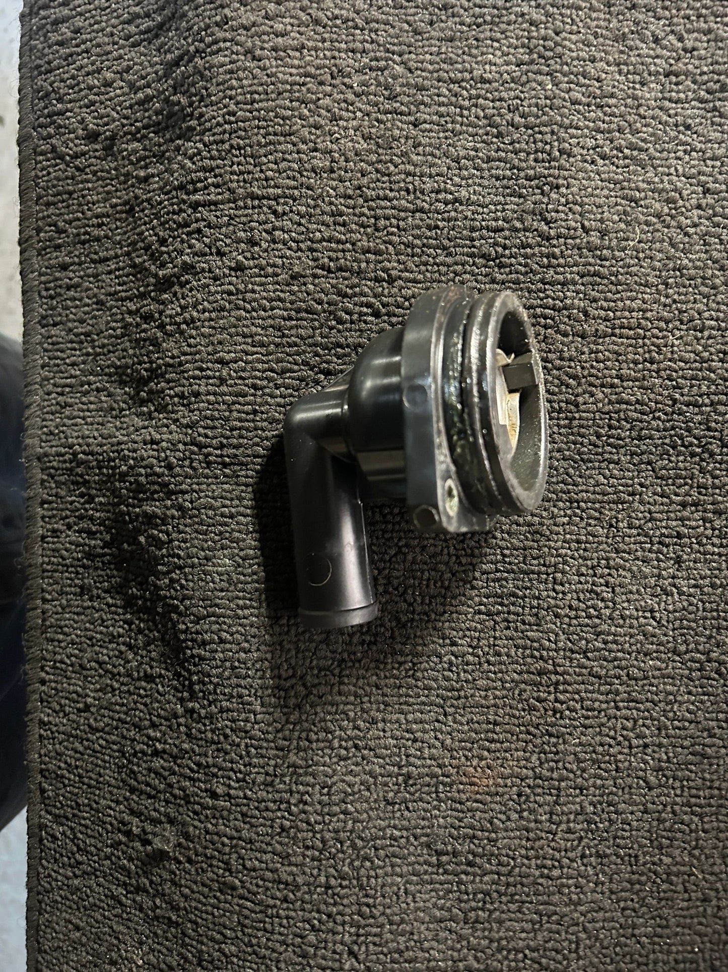 Rebuilt Mercury Verado thermostat housing