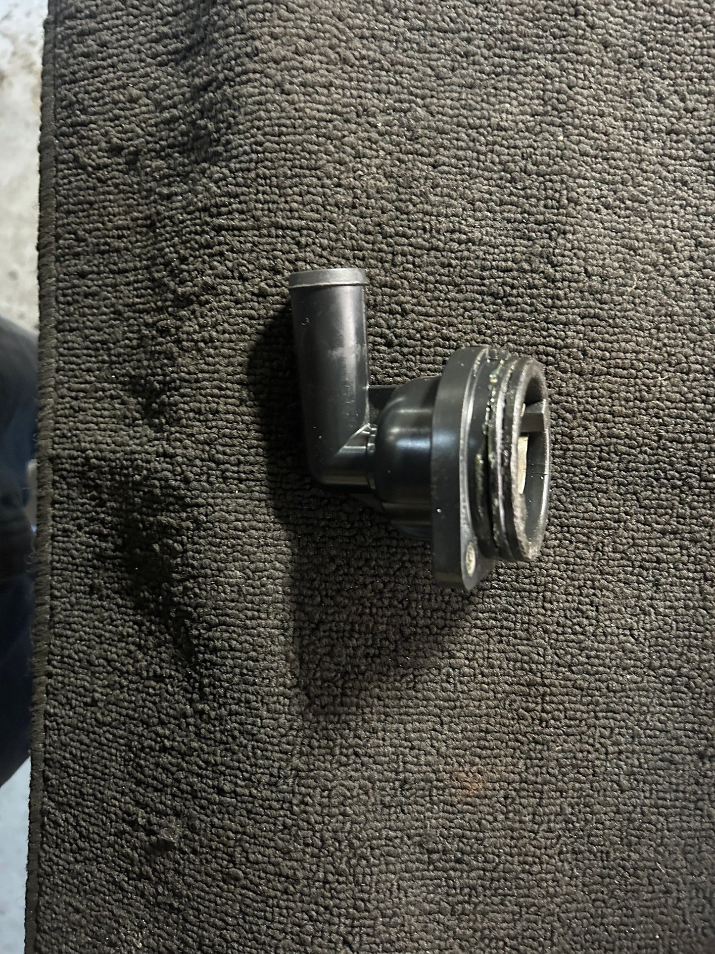 Rebuilt Mercury Verado thermostat housing